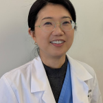 Photo of Dr. Kim smiling for a Headshot